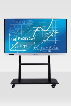 a computer screen with blueprint on it and black wheels in front of the monitor