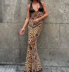 This summer, elevate your wardrobe with this stunning Lace Leopard Print Maxi Dress. Made with high-quality polyester fabric, this dress has a slight stretch for comfortable wear. The regular fit and straight silhouette flatter your figure, while the deep V-neckline and backless design add a touch of sensuality. The delicate lace detailing and ankle-length hemline bring a touch of elegance to this sexy and chic dress. Perfect for any occasion, this dress will surely turn heads and leave a lasting impression. Don't miss out on adding this dress to your collection - order now before it's gone! Leopard Print Maxi Dress, Backless Design, Style Maxi Dress, Mini Dresses Summer, Printed Maxi, Mini Dress With Sleeves, 50's Dress, Chic Dress, The Deep