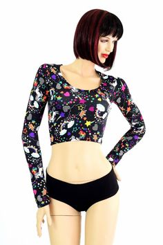 "This item is made to order, please read all the way through the listing before purchasing! UV glow top is a playful unicorn and rainbow print on lycra spandex. This crop top has a scoop neckline and long sleeves, and a four way stretch fit. LENGTH: 8\" (from the underarm to the hemline) Black zen soft knit cheekies are sold separately. Womens Sizing (See below for instructions on where measurements should be taken) XXS: Bust 29\"-30\" / Waist 22\"-23\" / Hips 30\"-32\" Extra Small: Bust 31\"-32 Unicorns And Rainbows, Unicorn And Rainbow, Neon Printing, Fabric Yardage, Rainbow Print, Long Sleeve Crop, Long Sleeve Crop Top, Soft Knits, Scoop Neckline