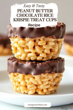 three peanut butter krispie treat cups stacked on top of each other