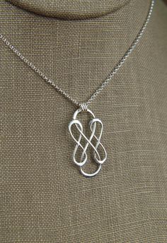 Triple infinity necklace in sterling silver, sterling silver necklace, infinity, eternity necklace, friendship, mother's day A sterling silver triple infinity symbol link that measures 1.18 x 0.59 inches (30 x 15mm) is suspended from a sterling silver chain with 3 jump rings and the chain can be any length up to 22 inches. It is secured with a sterling silver spring ring clasp. Your purchase will arrive in a jewelry box ready for gift giving or as a gift for yourself! Enter my shop here: jersey6 Cheap Infinity Shaped Jewelry Gift, Modern Infinity Necklace As Gift, Sterling Silver Infinity Necklace In White Gold, Modern Twist Infinity Necklaces As Gifts, Modern Twist Infinity Necklace As Gift, Modern Twist Infinity Necklace For Gift, Modern Twist Infinity Necklace For Gifts, Modern Twist Sterling Silver Necklace In Silver, Modern Twist Silver Sterling Silver Necklace