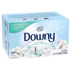 downy toilet paper rolls are shown on a white background with the words downy written in