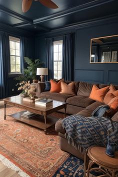 a living room filled with furniture and blue walls