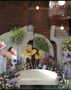 a bunch of flowers that are on display