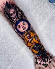 a person with a tattoo on their arm that has an image of two people in the background