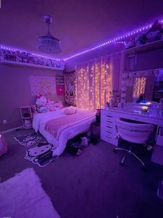 a bedroom with hello kitty lights on the ceiling