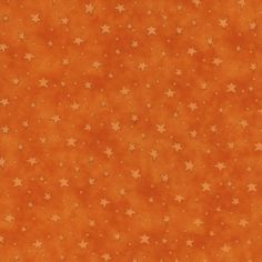 an orange background with gold stars on it