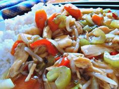 a close up of food on a plate with rice