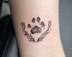 a dog's paw print on the ankle