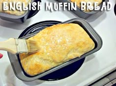 a pan with some food in it on top of a stove and the words english muffins above it