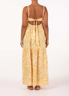 FINAL SALE Light and summery, this effortless maxi dress features a perfectly contoured bodice, statement open back, adjustable ties for the perfect fit and relaxed skirt that falls to a floaty tier. Pair with your favorite sandal to take you from market strolls to sunset aperitifs. Made from European Flax which is naturally sustainable, biodegradable and becomes more beautiful with wear. In Peony's exclusive Daffodil floral print in shades of yellow. Statement open back with adjustable ties for Casual Long Dress With Tie Back, Maxi Length Dress With Adjustable Straps For Brunch, Maxi Dress With Adjustable Straps For Brunch, Midi Maxi Dress With Adjustable Straps For Day Out, Floor-length Tie Back Maxi Dress For Beach, Maxi Dress With Adjustable Straps For Casual Wear, Spring Brunch Maxi Dress With Adjustable Straps, Spring Maxi Dress With Adjustable Straps For Brunch, Maxi Length Dresses With Tie Straps For Casual Wear