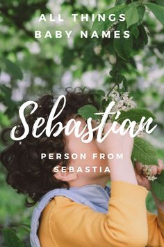 a woman in yellow shirt holding leaves over her face with the words sebastia on it