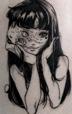 a girl with her face painted on the side of her thigh, holding her hands to her face