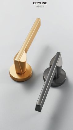 an image of a gold and silver bathroom faucet