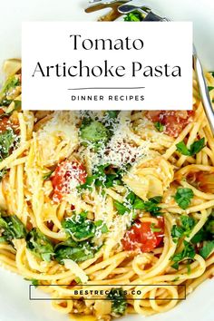 a white plate topped with pasta covered in sauce and parmesan cheese next to a fork