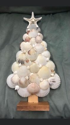 a christmas tree made out of seashells