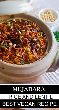 a bowl filled with rice and lentils on top of a table