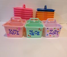 five plastic storage containers with name and stars on the side, one for each container