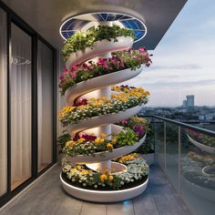 a spiral planter on top of a building with flowers growing in the bottom tier