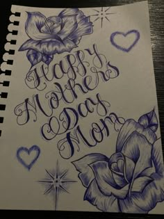 a notebook with the words happy mother's day written in blue ink on it