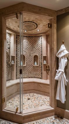 a walk in shower sitting inside of a bathroom