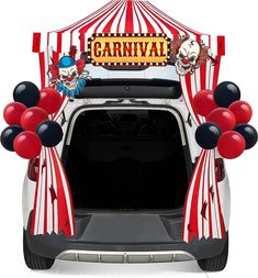 the back end of a car with balloons and clowns on it