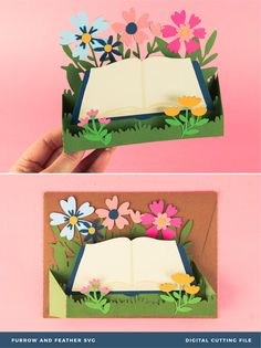 an open book with flowers on it and the pages cut out to look like books