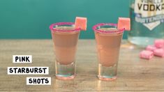 two pink starburst shots sitting next to each other