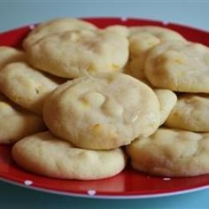 a red plate topped with cookies on top of a table