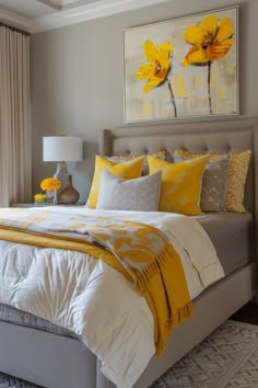 a bedroom with yellow and gray decor on the walls