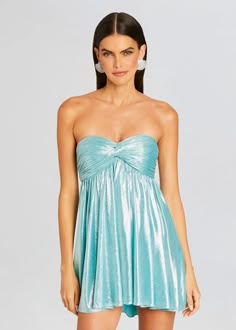 Enhance your soiree style with our Kaiser Dress. This strapless mini piece features a pleated bodice, coordinating skirt, and a bright metallic finish. Shown here in Sea Foam. 95% Polyester, 5% Spandex Made in China Model is 5'10" wearing size S Style No. FW22-5608 Hoco Inspo, Cute Homecoming Dresses, Rehearsal Dress, School Dance, Pleated Bodice, Silk Mini Dress, Metallic Dress, Maxi Gowns, Hoco Dresses