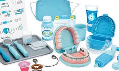 an assortment of toys including toothbrushes, mouthwash and teethpaste are shown