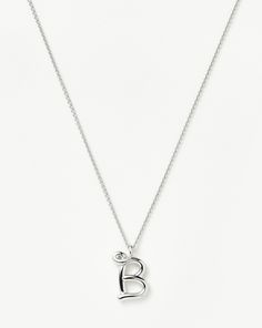 Curly Molten Initial Pendant Necklace - Initial B | Sterling Silver. Spell It Out. On a Delicate Trace Chain, this Unique Initial Pendant Necklace Features Your Chosen Letter in a Bespoke Hand-Drawn Font. A Versatile Layering Piece, Keep It for Yourself or Give as the Ultimate Personalized Gift. Metal: Recycled Sterling Silver Dimensions: 16 mm X 17. 4mm Total Length: 500mm Adjustable from 460mm - 500mm Weight: 6. 7g Product Code: Inl-S-N2-Ns-B Initial B, Necklace Length Guide, Sterling Silver Initial, Necklace Initial, Earring Trends, Initial Pendant Necklace, Demi Fine Jewelry, Gold Price, Personalized Initials