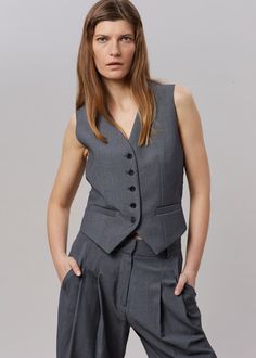 Color: Dark Grey MelangeLightweight traditional suiting fabric Fitted waistcoat Button front closureWelt front pockets Adjustable buckle backLined65% Lyocell 25% Rayon 10% WoolDry CleanBy The Frankie Shop. Imported Kdrama Fashion Outfits, Minimalist Korean Fashion, Waistcoat Outfit Women, Women Professional Outfits, Old Money Style Women, Women Smart Casual, Fitted Waistcoat, Grey Waistcoat, Waistcoat Women