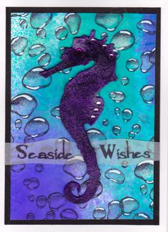 a card with a purple and blue seahorse on it's side, surrounded by bubbles