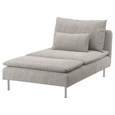 a gray chaise lounger with pillows on it's back and legs, viewed from the front