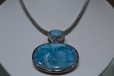 Show stopping beauty! This necklace is unique and worth every penny. Pendant Materials* Real 925 Sterling Silver * Blue Larimar Gemstone* Hypoallergenic, Lead & Nickel Free* Plating: Rhodium Plated for Tarnish Free Finish* Includes 18 IN Box Chain Oval Blue Larimar Jewelry, Oval Larimar Jewelry For Anniversary, Elegant Larimar Cabochon Jewelry, Larimar Necklace, Larimar Stone, Opal Pendants, Silver Blue, Box Chain, Stone Pendants