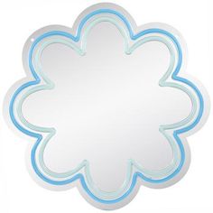 a white and blue flower shaped mirror