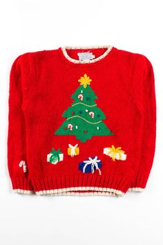 a red sweater with a christmas tree on the front and candy canes on the back