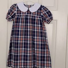 Nwot Beaufort Bonnet Company Red And Blue Plaid Dress With White Peter Pan Collar. Adorable Plaid That Is Perfect For Memorial Day, Labor Day 4th Of July Or Family Pictures. Size 8, But Easily Could Work For Size 6-10. Perfect For Back To School Too! Such A Classic Dress. Monogram On The White Peter Pants Collar Would Be Adorable. Fitted Multicolor Dress For School, Fitted Multicolor Dresses For School, Multicolor Fitted Dress For School, Preppy Short Sleeve Dresses For School, Preppy Short Sleeve School Dress, Navy Short Sleeve School Dress, Red Short Sleeve School Dress, Preppy Blue Dresses For School, Blue Long Sleeve Preppy Dress