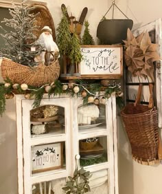 an old cabinet is decorated with christmas decorations