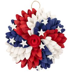 an ornament with red, white and blue flowers