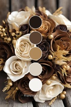 a bridal bouquet with brown and white flowers on it's side, including roses