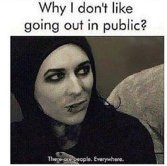 a woman with black makeup is looking at her cell phone and has the caption'why i don't like going out in public? '