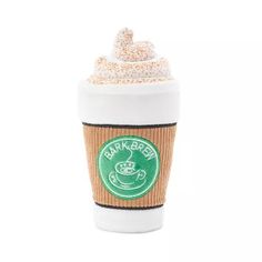 a coffee cup with sprinkles on top