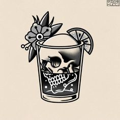 a skull in a glass with a flower on the top and an orange slice sticking out of it