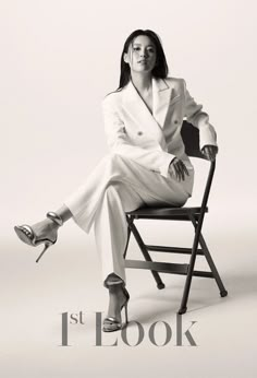 a woman sitting on top of a chair in front of a white background with the words i look