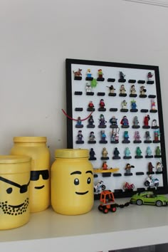 there are legos on the shelf next to each other