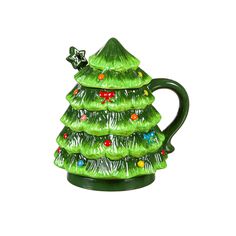 a green ceramic christmas tree ornament on a white background