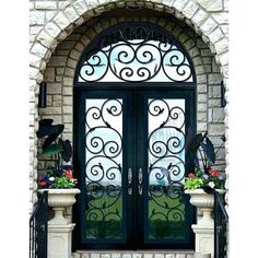 double iron door with transom and matte black frame Mediterranean Front Doors, Wrought Iron Entry Doors, Colorful Doors, Wrought Iron Front Door, Decorative Doors, Traditional Front Doors, Iron Front Door, Iron Entry Doors, Blue Doors